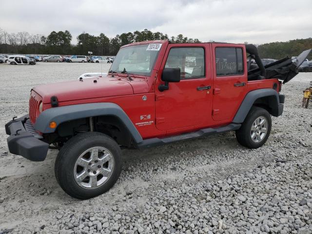 1J4GA391X9L765070 - 2009 JEEP WRANGLER U X RED photo 1