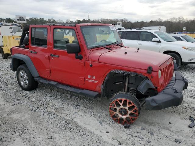 1J4GA391X9L765070 - 2009 JEEP WRANGLER U X RED photo 4