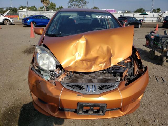 JHMGE8H45AS021551 - 2010 HONDA FIT SPORT ORANGE photo 5