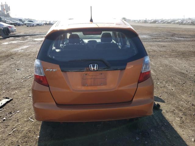 JHMGE8H45AS021551 - 2010 HONDA FIT SPORT ORANGE photo 6