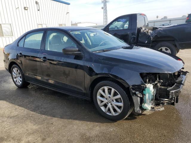 3VWD17AJ2FM268999 - 2015 VOLKSWAGEN JETTA SE BLACK photo 4