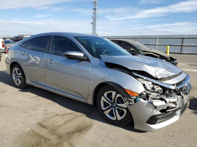 2HGFC2F56JH510738 - 2018 HONDA CIVIC LX SILVER photo 4