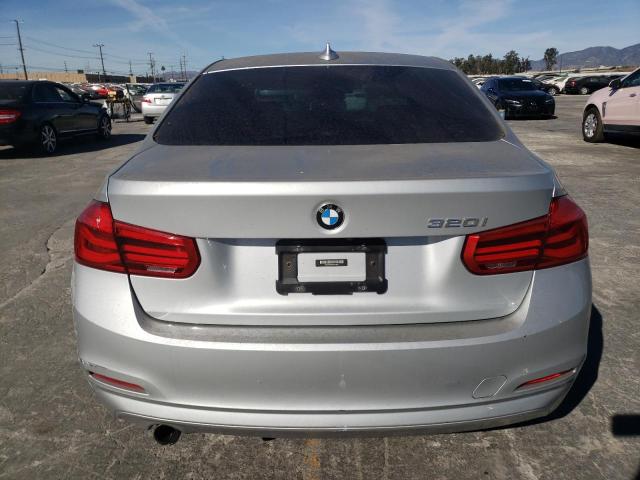 WBA8A9C58JAH12957 - 2018 BMW 320 I SILVER photo 6