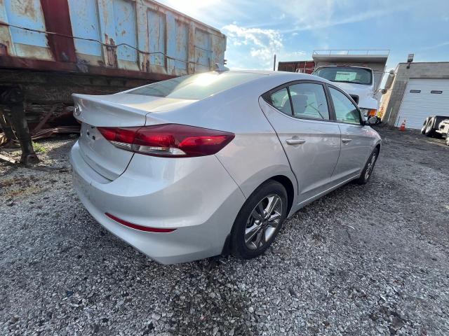 KMHD84LF0JU654312 - 2018 HYUNDAI ELANTRA SEL SILVER photo 4