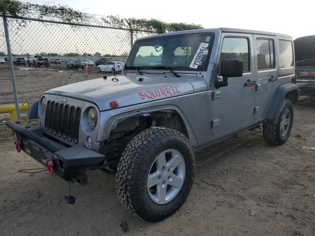 1C4HJWDG4FL544163 - 2015 JEEP WRANGLER U SPORT SILVER photo 1