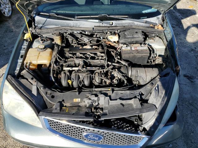 3FAFP31NX5R151877 - 2005 FORD FOCUS ZX3 GREEN photo 11