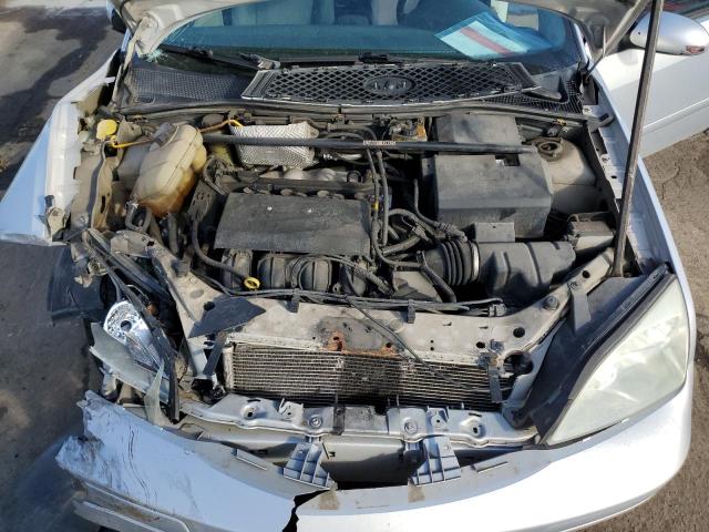 3FAFP31N45R113660 - 2005 FORD FOCUS ZX3 SILVER photo 11