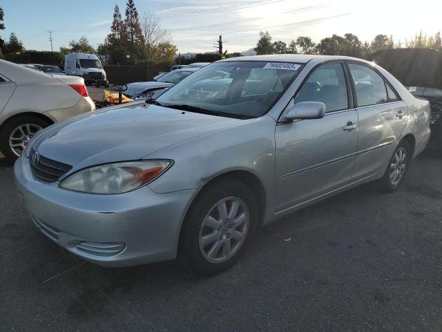 JTDBE30K620054404 - 2002 TOYOTA CAMRY LE SILVER photo 1