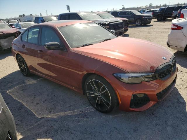 3MW5U9J06N8C34554 - 2022 BMW M340XI ORANGE photo 4