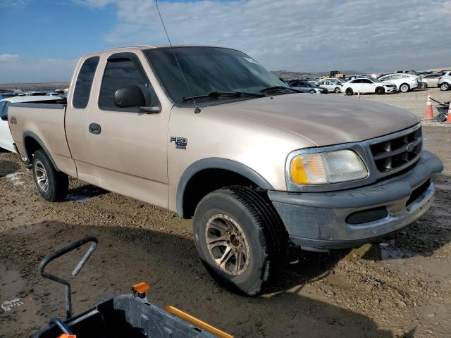 1FTRX18L1WKB30907 - 1998 FORD F150 TAN photo 4