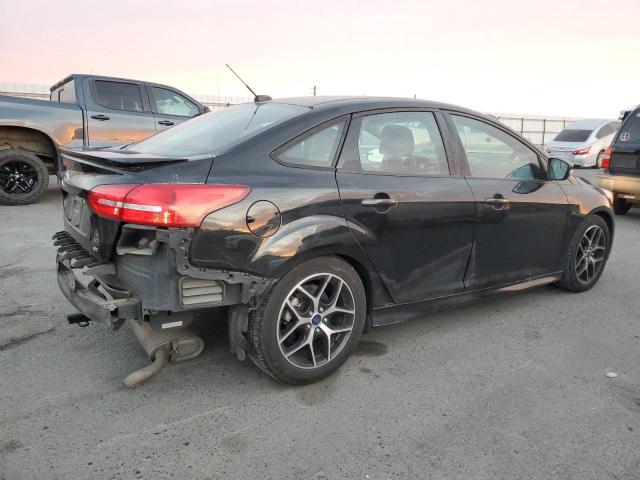 1FADP3F27FL324485 - 2015 FORD FOCUS SE BLACK photo 3