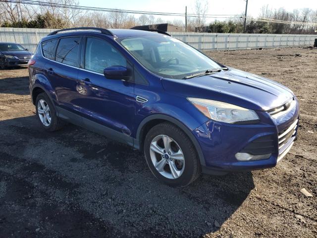 1FMCU9G93EUB67894 - 2014 FORD ESCAPE SE BLUE photo 4