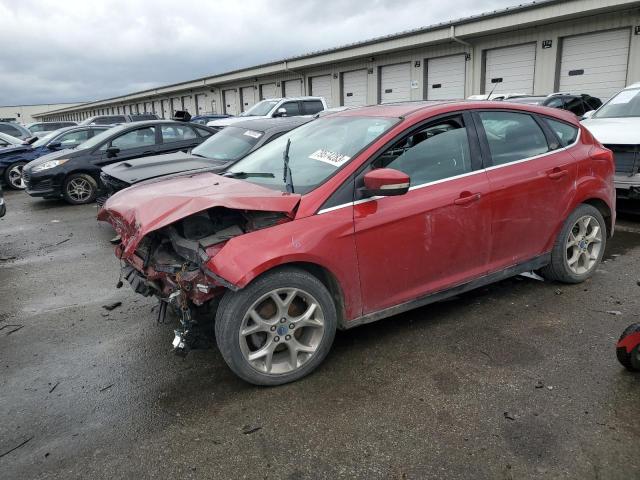 1FAHP3N23CL324093 - 2012 FORD FOCUS TITANIUM RED photo 1