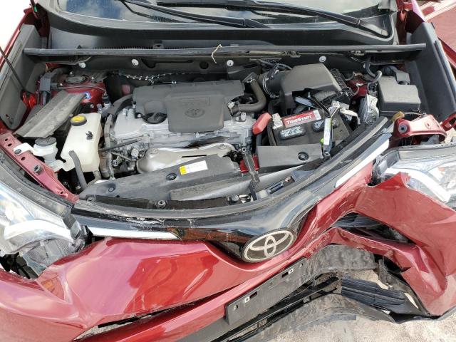 2T3ZFREV7JW415635 - 2018 TOYOTA RAV4 LE RED photo 11