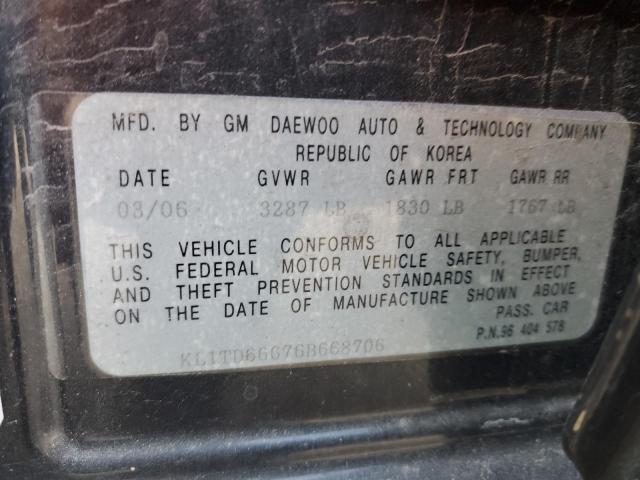 KL1TD66676B668706 - 2006 CHEVROLET AVEO BASE Qara foto 12