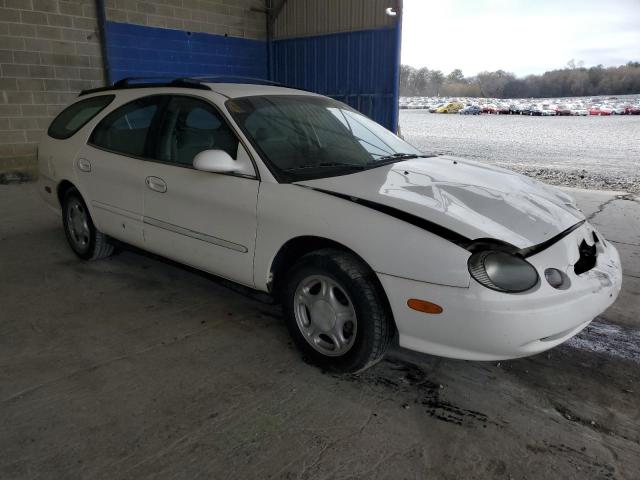 1FAFP58U8XA129186 - 1999 FORD TAURUS SE WHITE photo 4