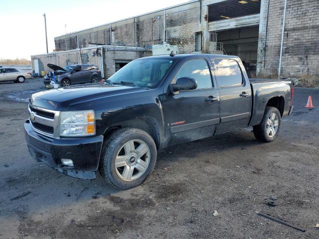 2GCEK13Y771634881 - 2007 CHEVROLET SILVERADO K1500 CREW CAB BLACK photo 1