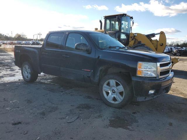 2GCEK13Y771634881 - 2007 CHEVROLET SILVERADO K1500 CREW CAB BLACK photo 4