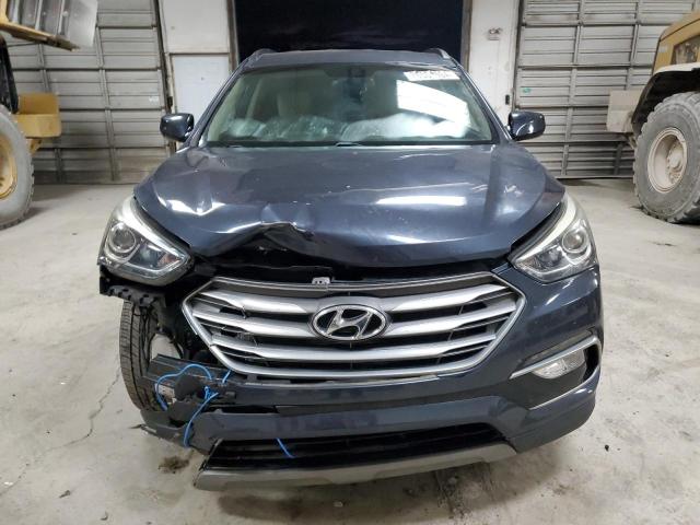 5NMZU3LB9HH020558 - 2017 HYUNDAI SANTA FE S BLUE photo 5