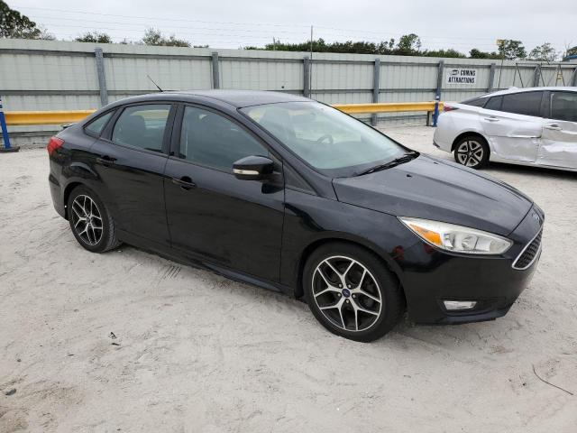 1FADP3F21GL382061 - 2016 FORD FOCUS SE BLACK photo 4