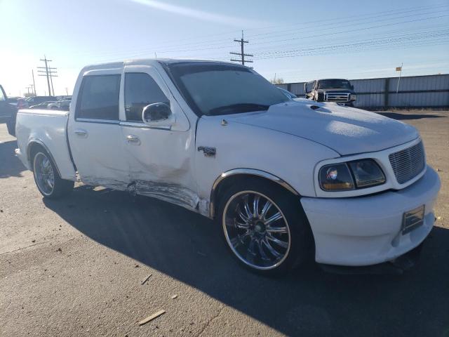 1FTRW07L71KB95445 - 2001 FORD F150 SUPERCREW WHITE photo 4