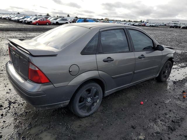 1FAHP34N55W174677 - 2005 FORD FOCUS ZX4 GRAY photo 3