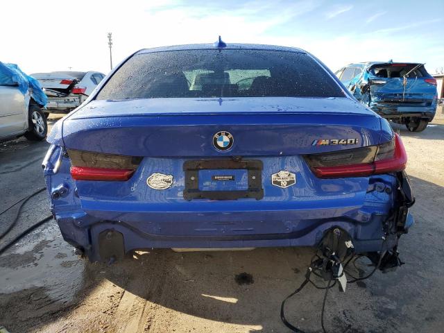 3MW5U7J05M8B60188 - 2021 BMW M340I BLUE photo 6