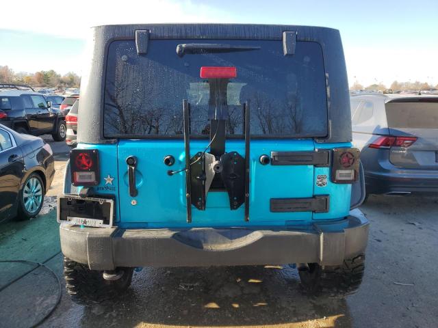 1C4BJWDG4GL334962 - 2016 JEEP WRANGLER U SPORT BLUE photo 6