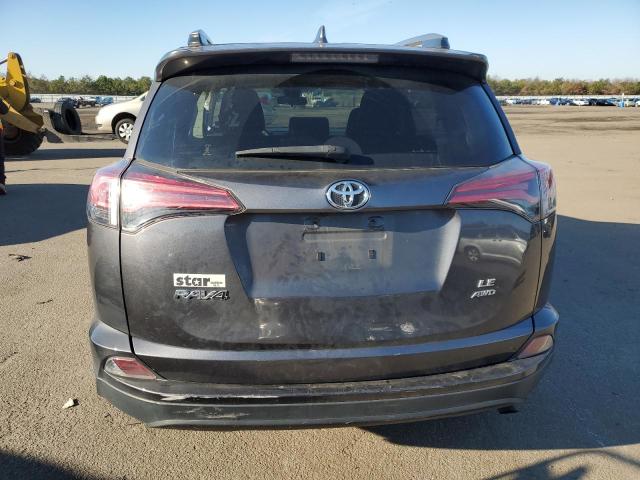 JTMBFREV2JJ205900 - 2018 TOYOTA RAV4 LE GRAY photo 6