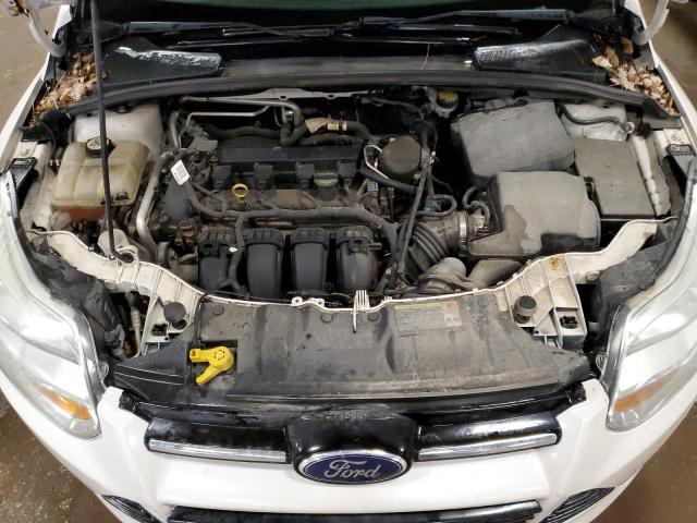 1FAHP3M27CL354781 - 2012 FORD FOCUS SEL WHITE photo 11