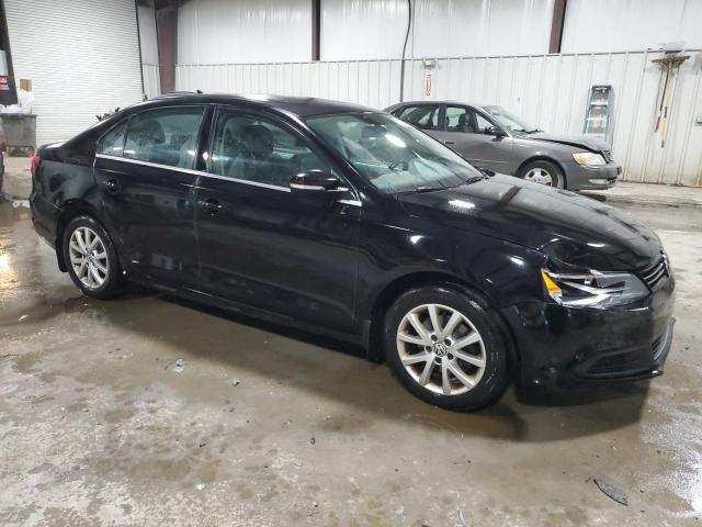 3VWD17AJ5EM431272 - 2014 VOLKSWAGEN JETTA SE BLACK photo 4