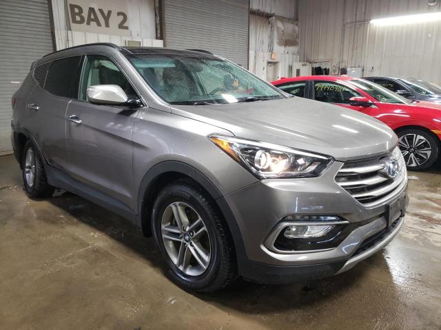 5NMZU3LB6JH056875 - 2018 HYUNDAI SANTA FE S TAN photo 4