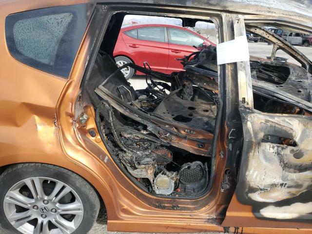 JHMGE88449S020922 - 2009 HONDA FIT SPORT GOLD photo 10