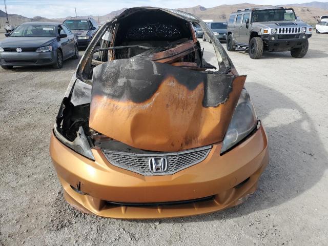 JHMGE88449S020922 - 2009 HONDA FIT SPORT GOLD photo 5