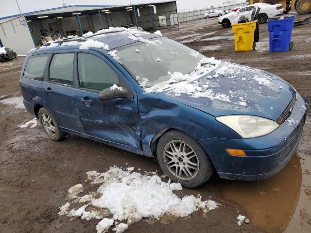 1FAFP36P7YW207883 - 2000 FORD FOCUS SE BLUE photo 4