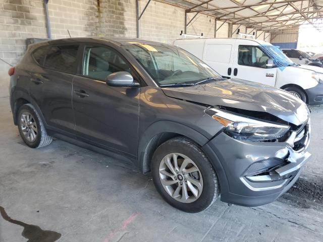 KM8J23A4XGU101630 - 2016 HYUNDAI TUCSON SE GRAY photo 4