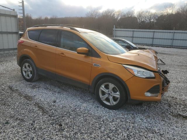 1FMCU0GXXGUB11674 - 2016 FORD ESCAPE SE ORANGE photo 4