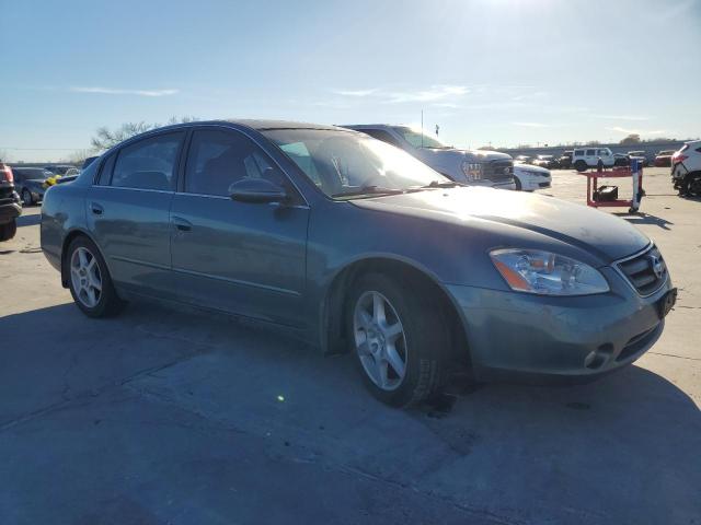 1N4BL11E52C150581 - 2002 NISSAN ALTIMA SE TEAL photo 4