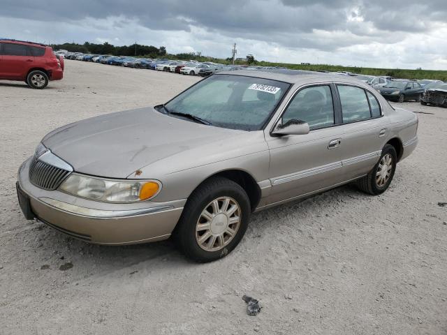 1LNHM97V61Y696164 - 2001 LINCOLN CONTINENTA GOLD photo 1