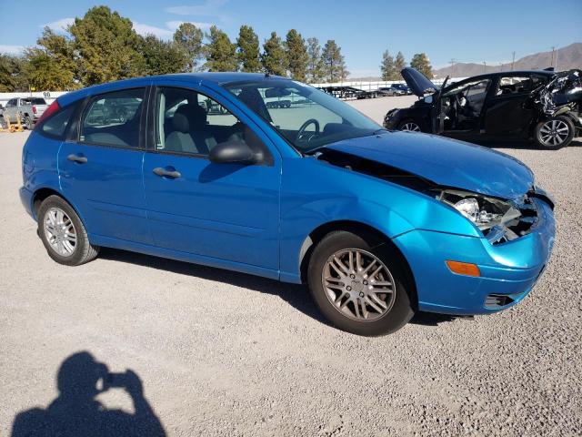 1FAFP37N17W272000 - 2007 FORD FOCUS ZX5 BLUE photo 4