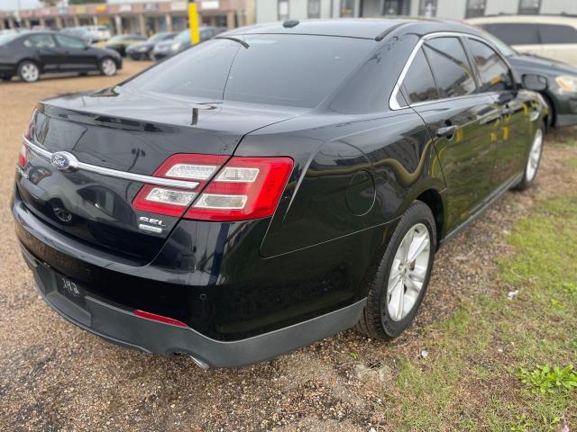 1FAHP2E96GG111242 - 2016 FORD TAURUS SEL BLACK photo 4