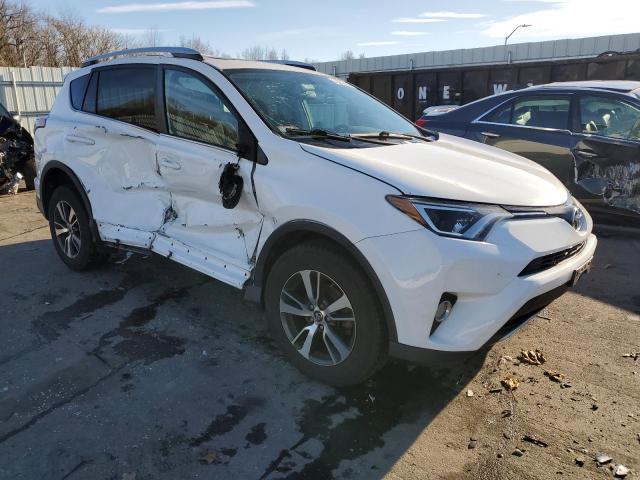 2T3RFREV0GW464538 - 2016 TOYOTA RAV4 XLE WHITE photo 4