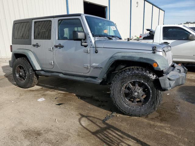 1C4BJWDG4EL116159 - 2014 JEEP WRANGLER U SPORT SILVER photo 4