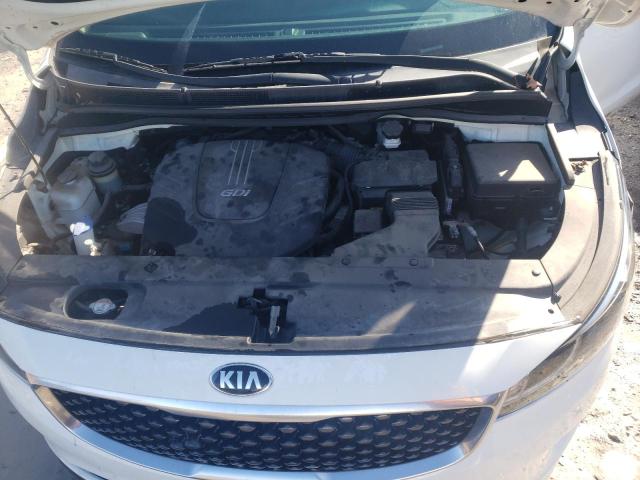 KNDMB5C13G6162449 - 2016 KIA SEDONA LX WHITE photo 12