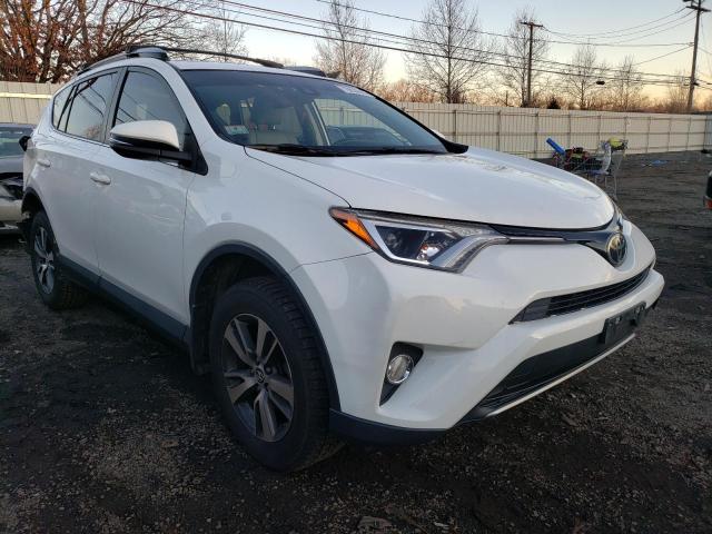 JTMRFREV7JJ230631 - 2018 TOYOTA RAV4 ADVENTURE WHITE photo 4