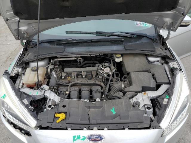 1FADP3K21HL302491 - 2017 FORD FOCUS SE SILVER photo 11