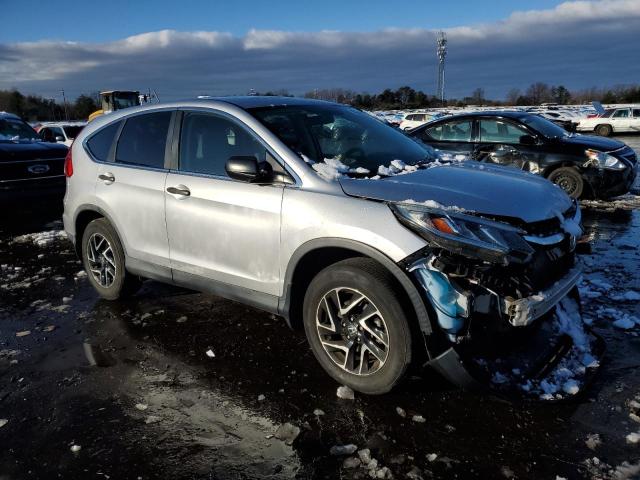 2HKRM4H46GH670904 - 2016 HONDA CR-V SE SILVER photo 4