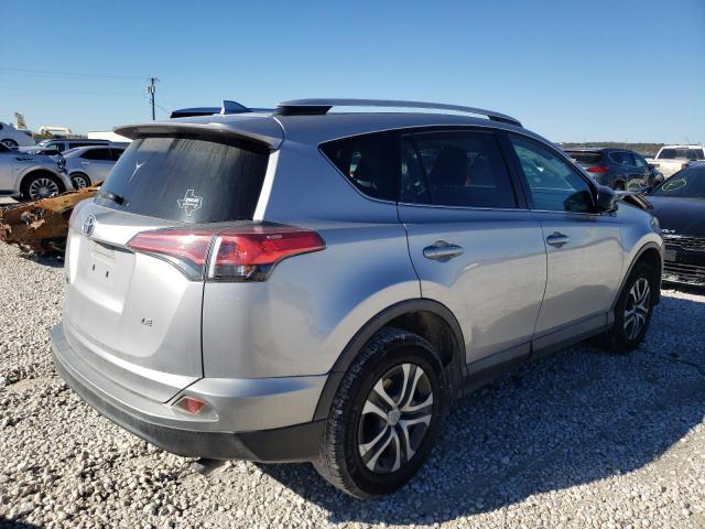 2T3ZFREVXGW278604 - 2016 TOYOTA RAV4 LE SILVER photo 3