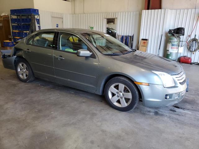 3FAFP07Z96R218933 - 2006 FORD FUSION SE GREEN photo 4