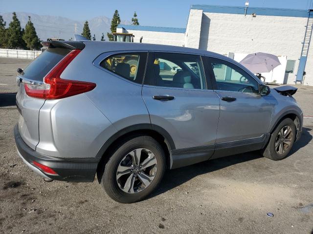 2HKRW5H31KH414489 - 2019 HONDA CR-V LX SILVER photo 3